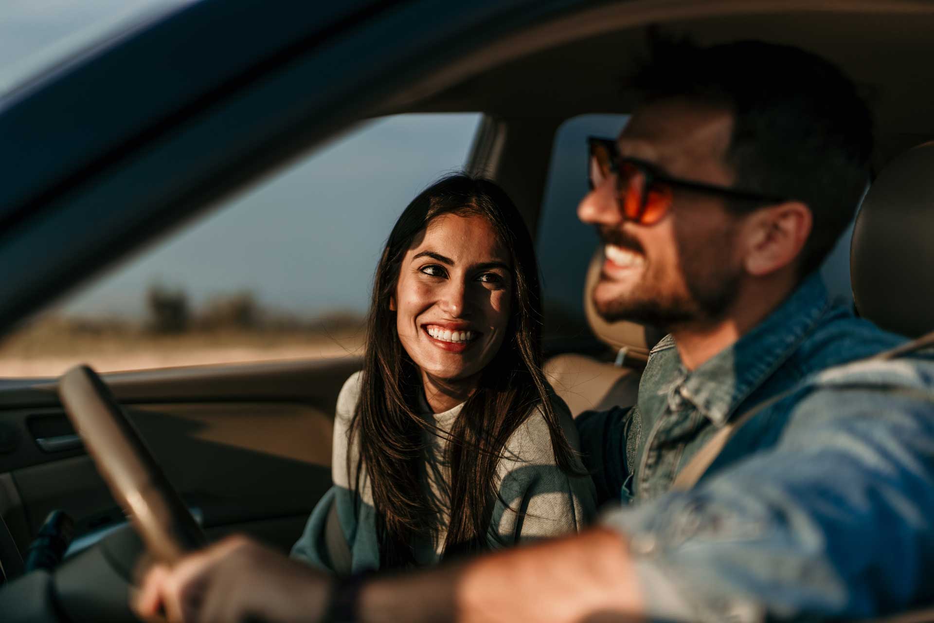 Woman and Man in a car on a sunny road | DUII Services Emergence | Addiction and Behavioral Therapies in Oregon