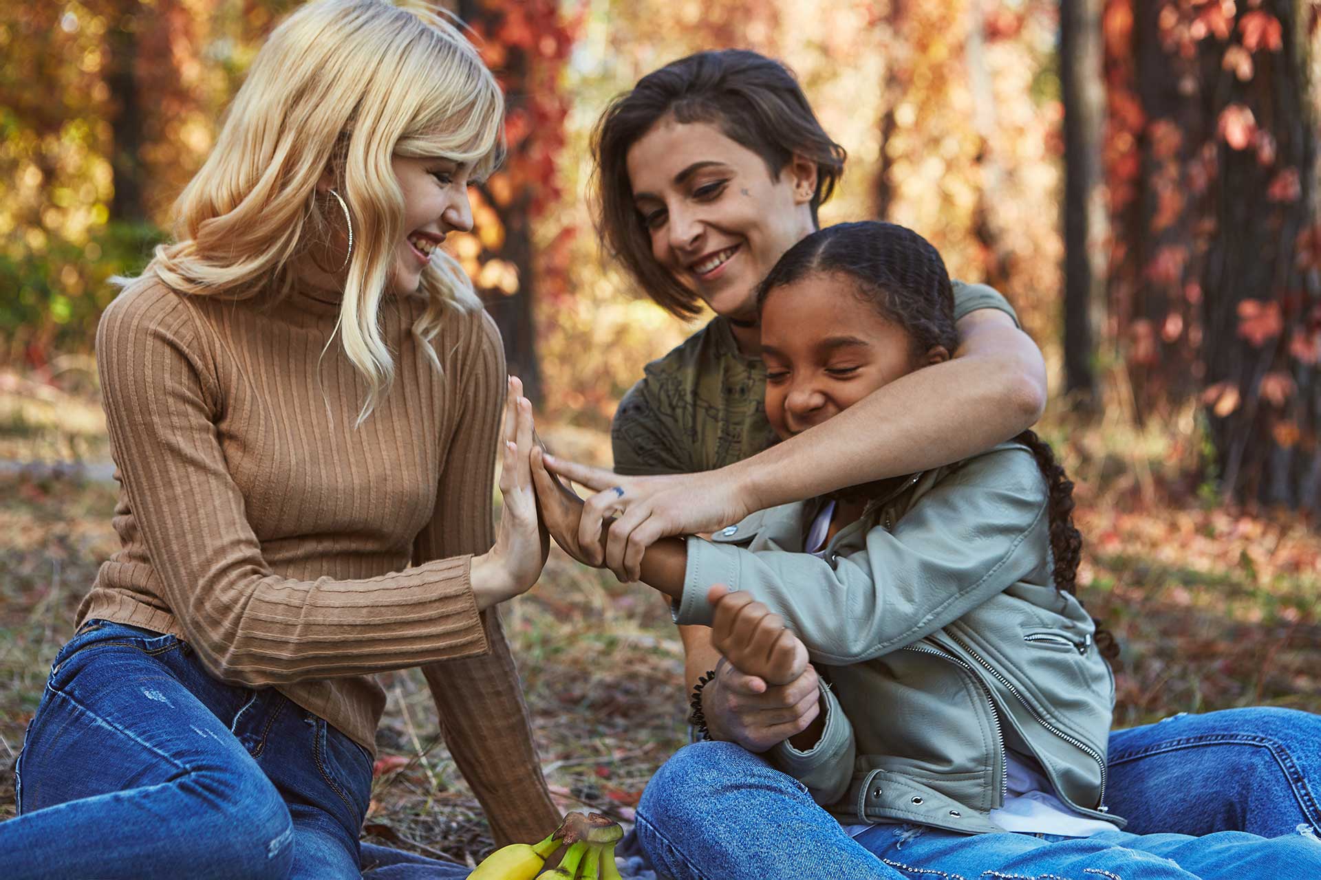 Two women and a child in a fall setting | Mental Health Counseling Emergence | Addiction and Behavioral Therapies in Oregon